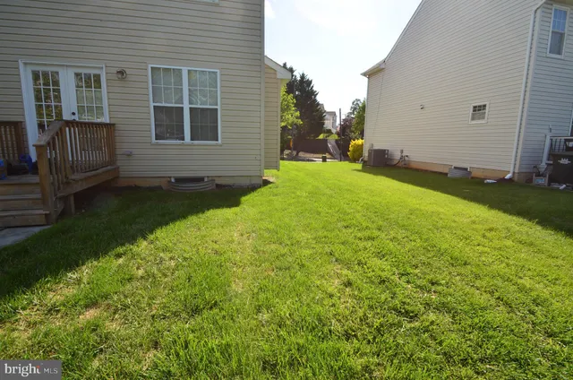 a view of a backyard with a garden