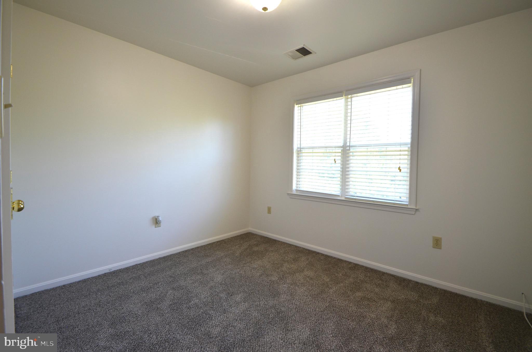 4 Ridge Road Southeast Washington, DC 20019 - Photo 33 of 47 an empty room with a window