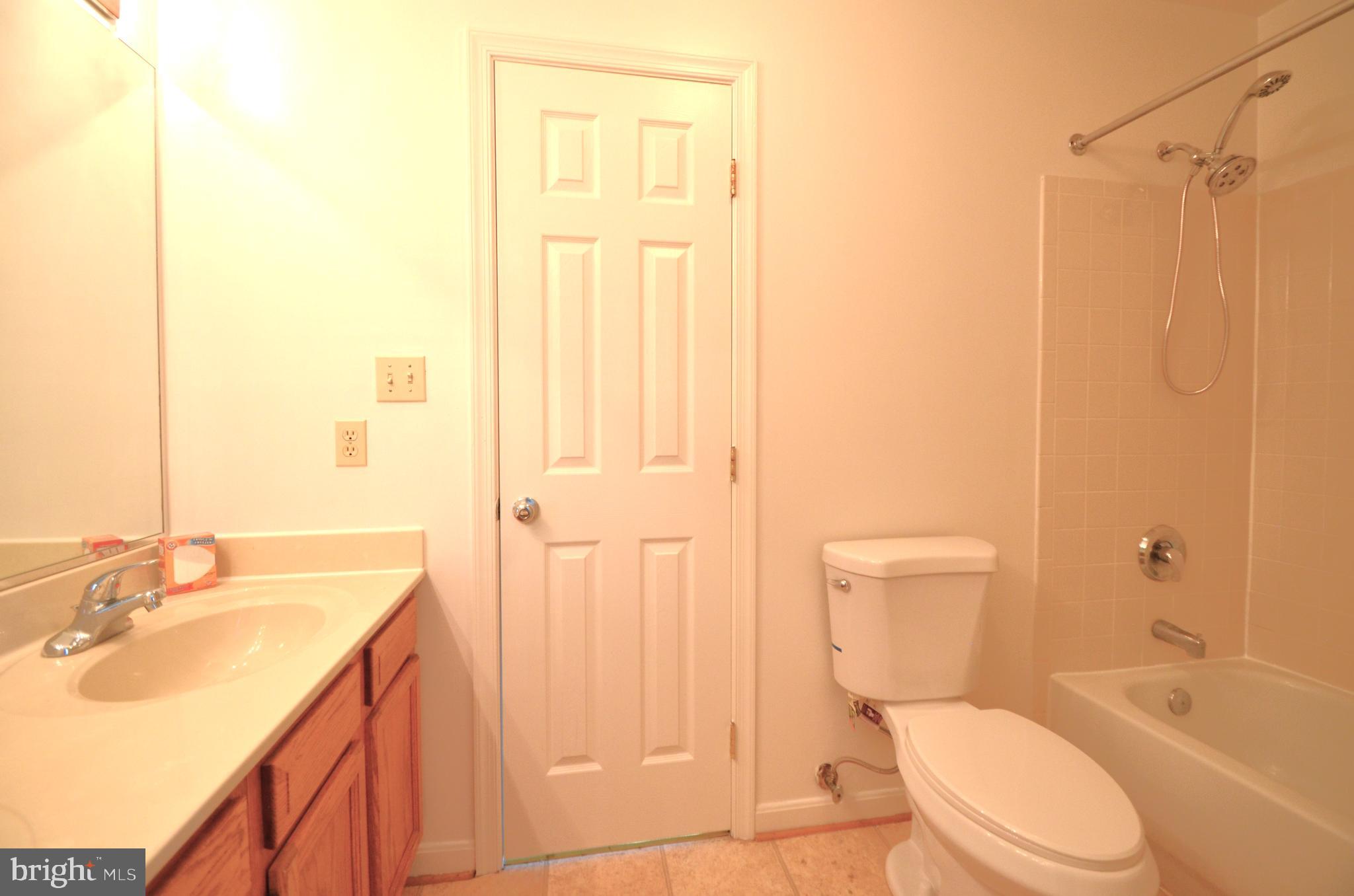 4 Ridge Road Southeast Washington, DC 20019 - Photo 39 of 47 a bathroom with a sink a toilet and shower