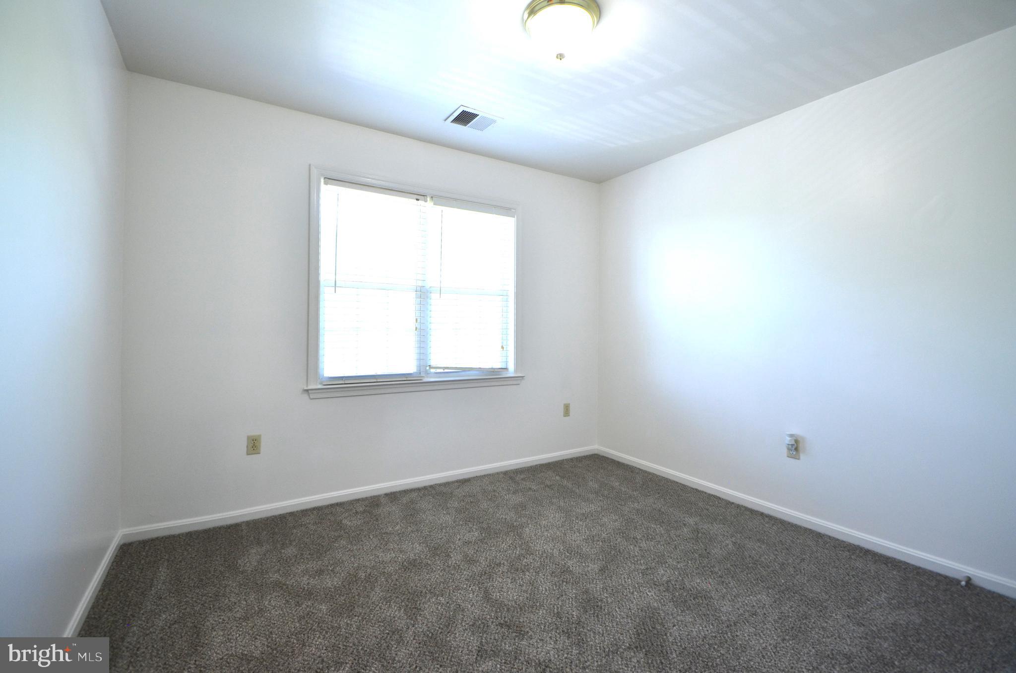 4 Ridge Road Southeast Washington, DC 20019 - Photo 40 of 47 an empty room with a window