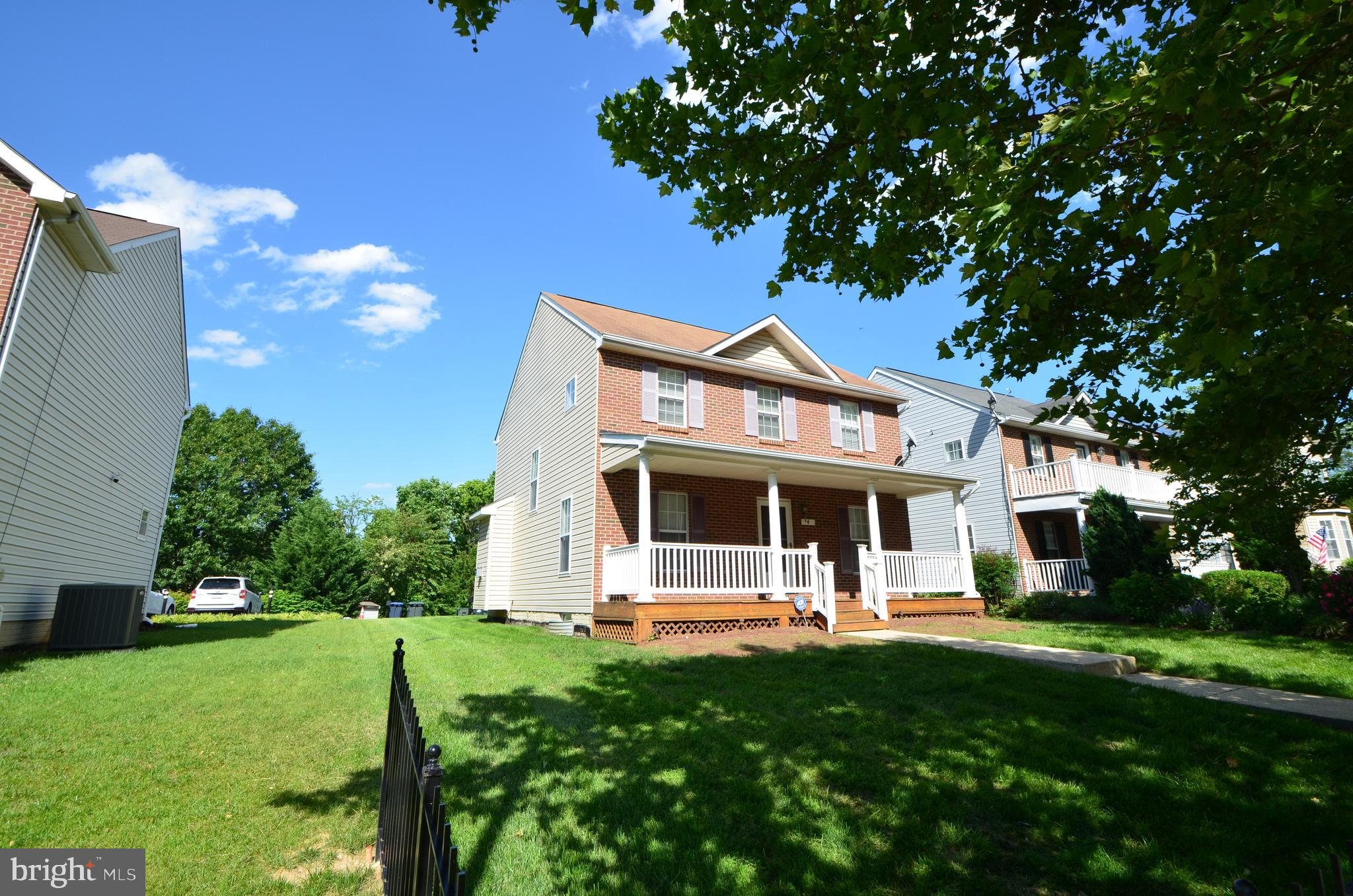 4 Ridge Road Southeast Washington, DC 20019 - Photo 43 of 47 a front view of a house with a yard