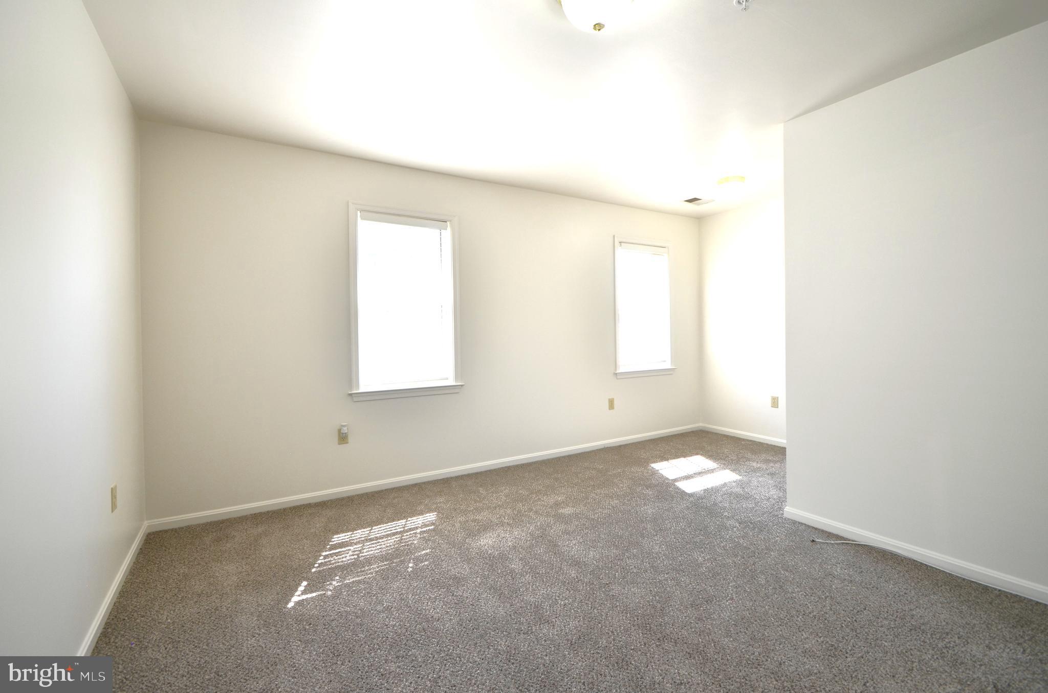 4 Ridge Road Southeast Washington, DC 20019 - Photo 6 of 47 an empty room with windows