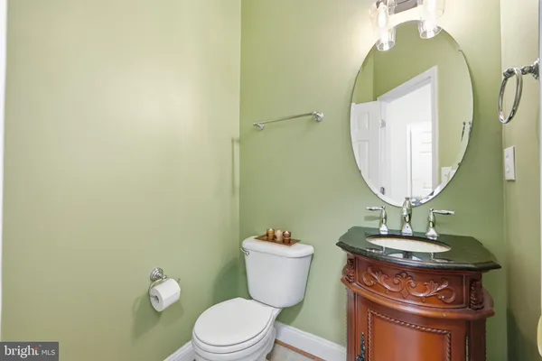 a living room with a fireplace and a window