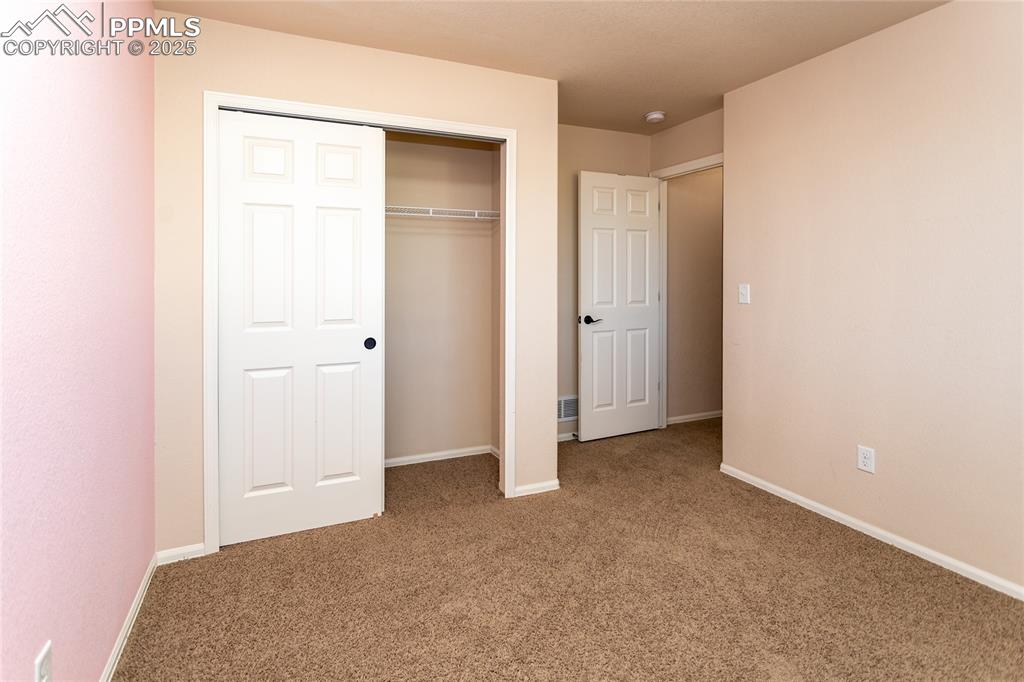 6806 Red Cardinal Loop Colorado Springs, CO 80908 - Photo 15 of 32 a view of an empty room