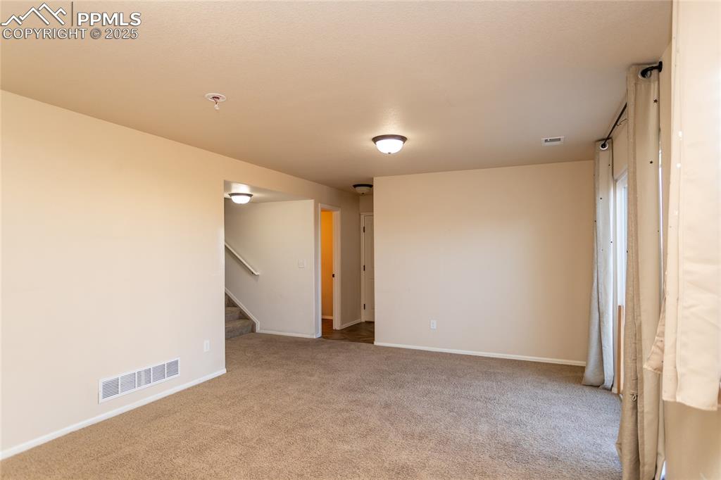 6806 Red Cardinal Loop Colorado Springs, CO 80908 - Photo 17 of 32 a view of an empty room
