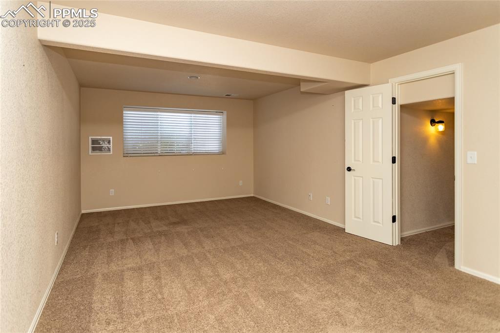 6806 Red Cardinal Loop Colorado Springs, CO 80908 - Photo 21 of 32 a view of an empty room