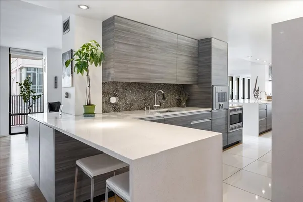 a view of balcony with wooden floor