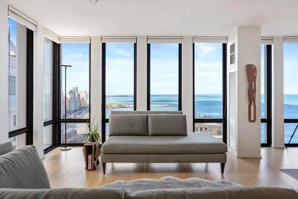 a view of a city with a lake