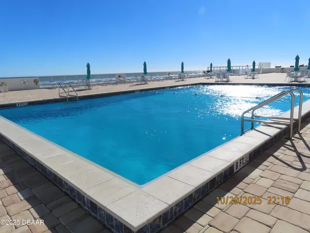 a view of a terrace with chairs