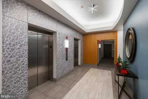 a room with furniture and a chandelier