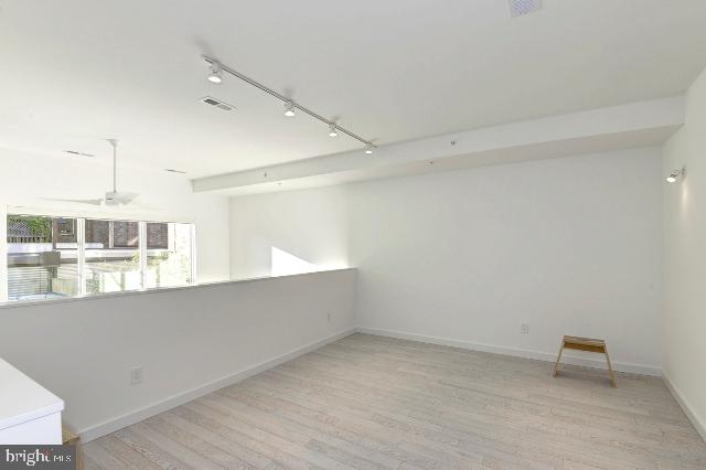 1234 10th Street Northwest, Unit A Washington, DC 20001 - Photo 12 of 17 a view of a room with a window