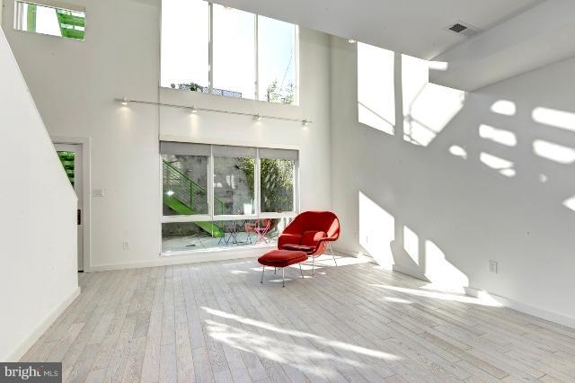 1234 10th Street Northwest, Unit A Washington, DC 20001 - Photo 4 of 17 a living room with wooden floor