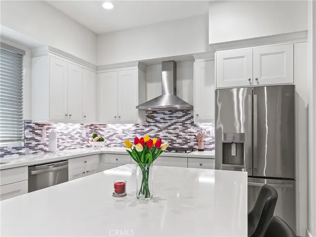 a bedroom with a bed and a table