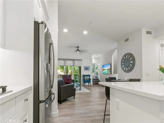 a en suite bathroom with a double vanity sink and mirror