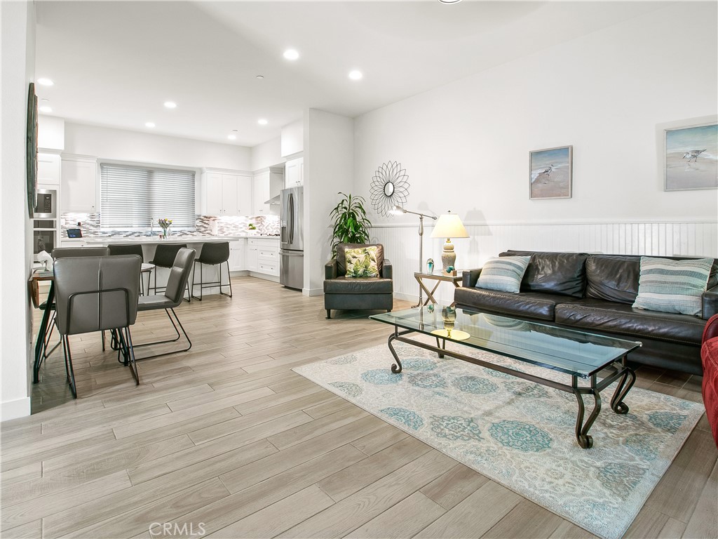 985 Doheny Way Dana Point, CA 92629 - Photo 32 of 53 a living room with furniture and a rug