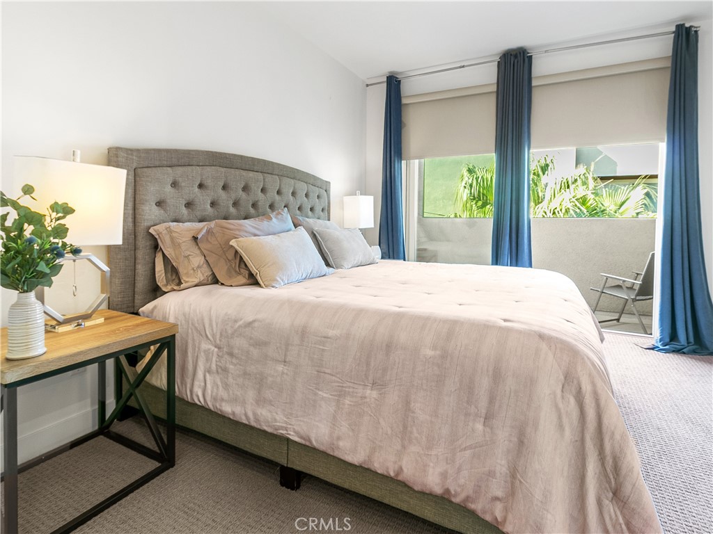 985 Doheny Way Dana Point, CA 92629 - Photo 40 of 53 a bedroom with a bed and a window