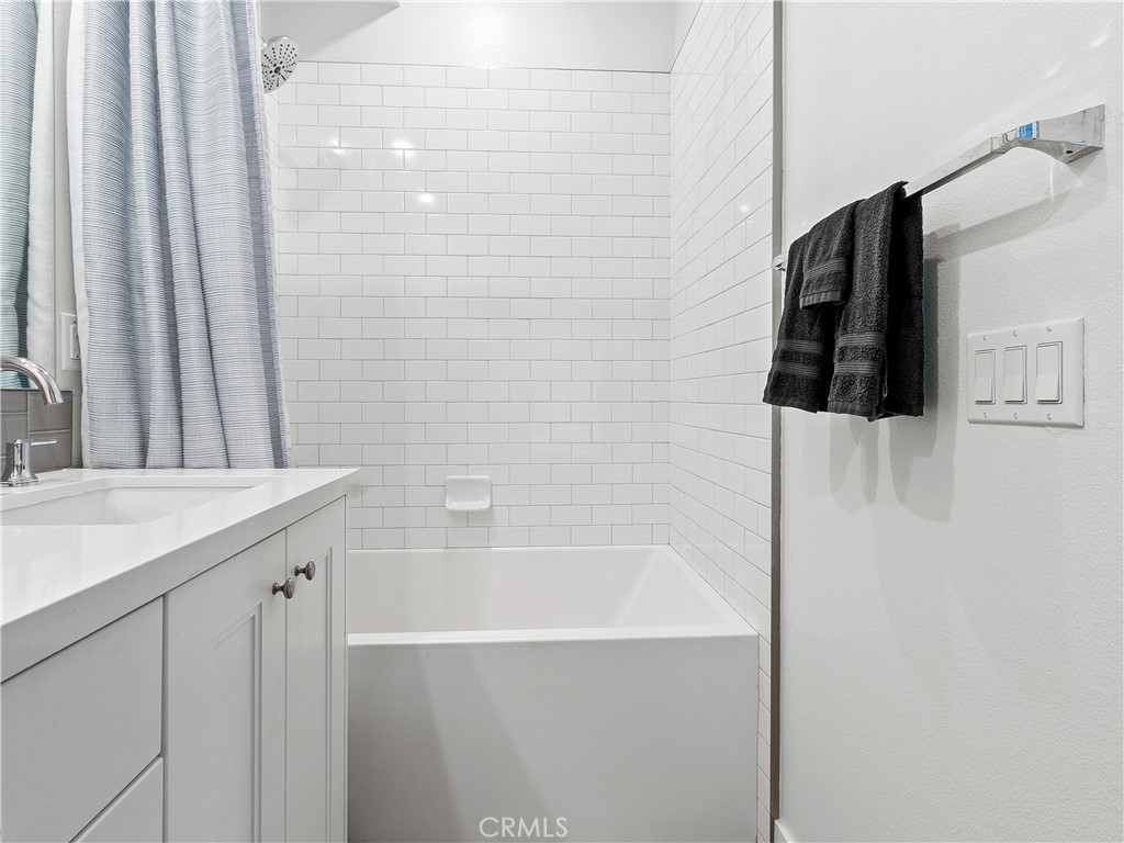 985 Doheny Way Dana Point, CA 92629 - Photo 51 of 53 a bathroom with a bathtub and a sink