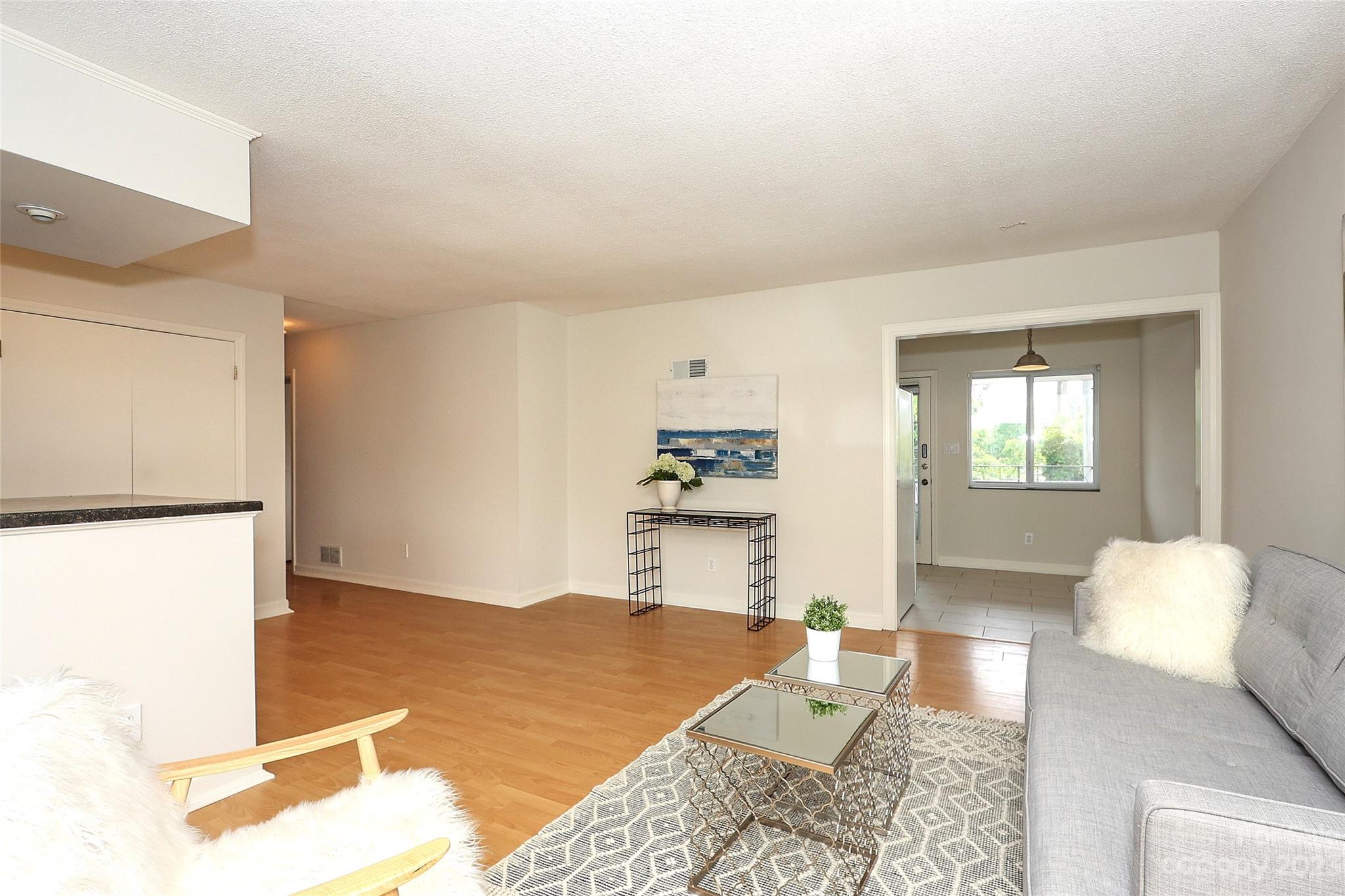 3010 Crosby Road, Unit 220 Charlotte, NC 28211 - Photo 11 of 39 a bedroom with a bed and a couch