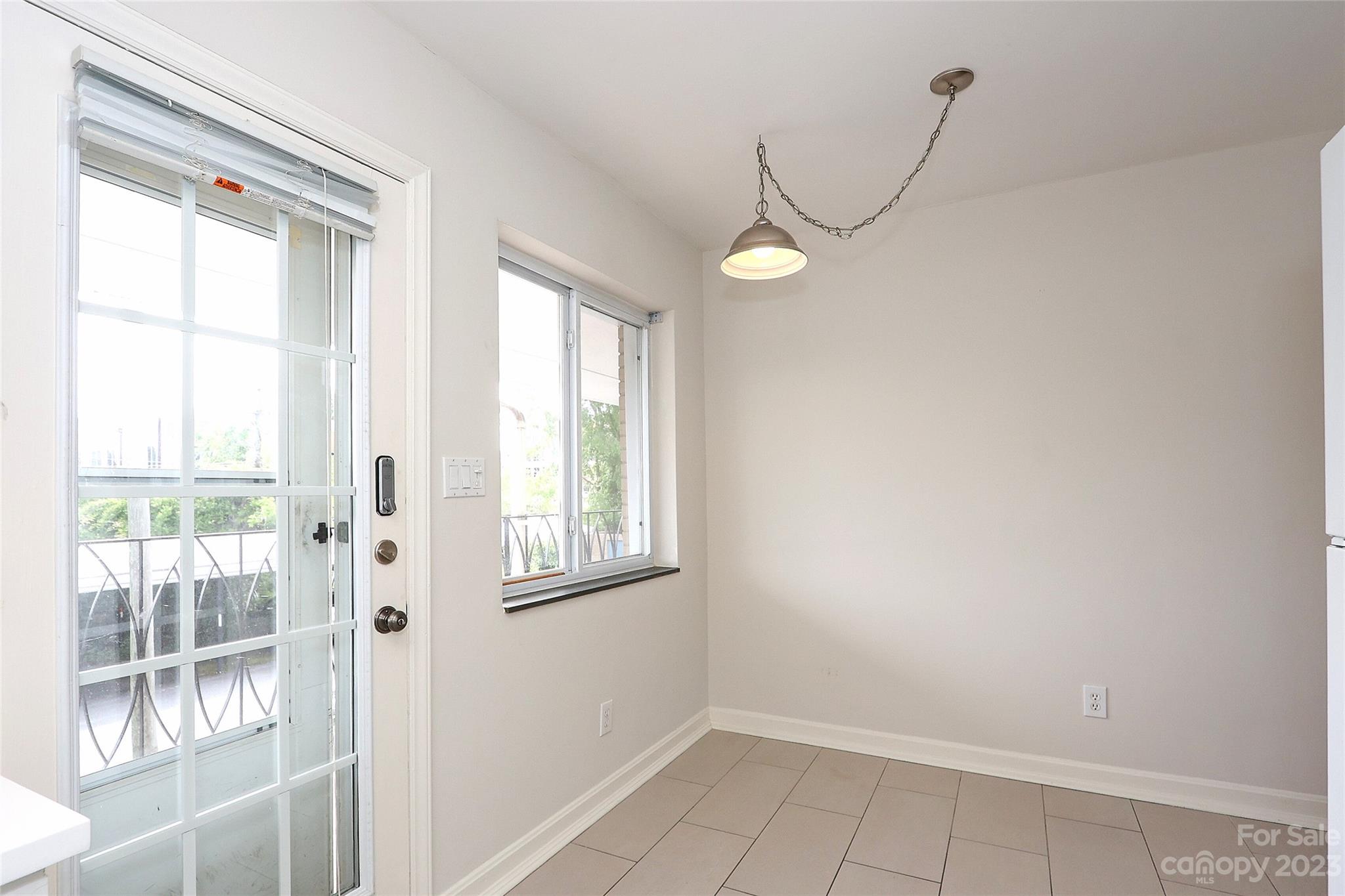 3010 Crosby Road, Unit 220 Charlotte, NC 28211 - Photo 16 of 39 a view of an empty room with a window