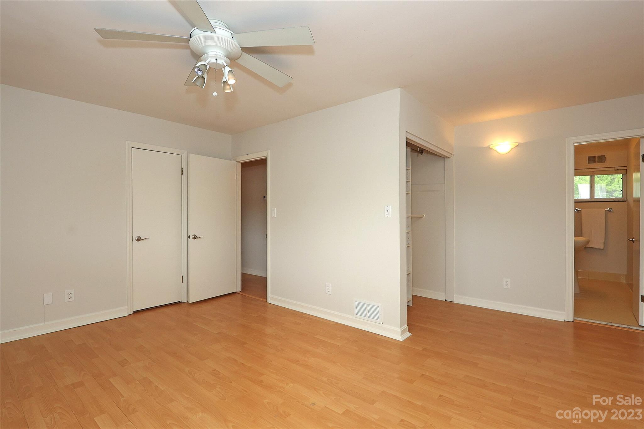 3010 Crosby Road, Unit 220 Charlotte, NC 28211 - Photo 21 of 39 a view of an empty room with a chandelier fan