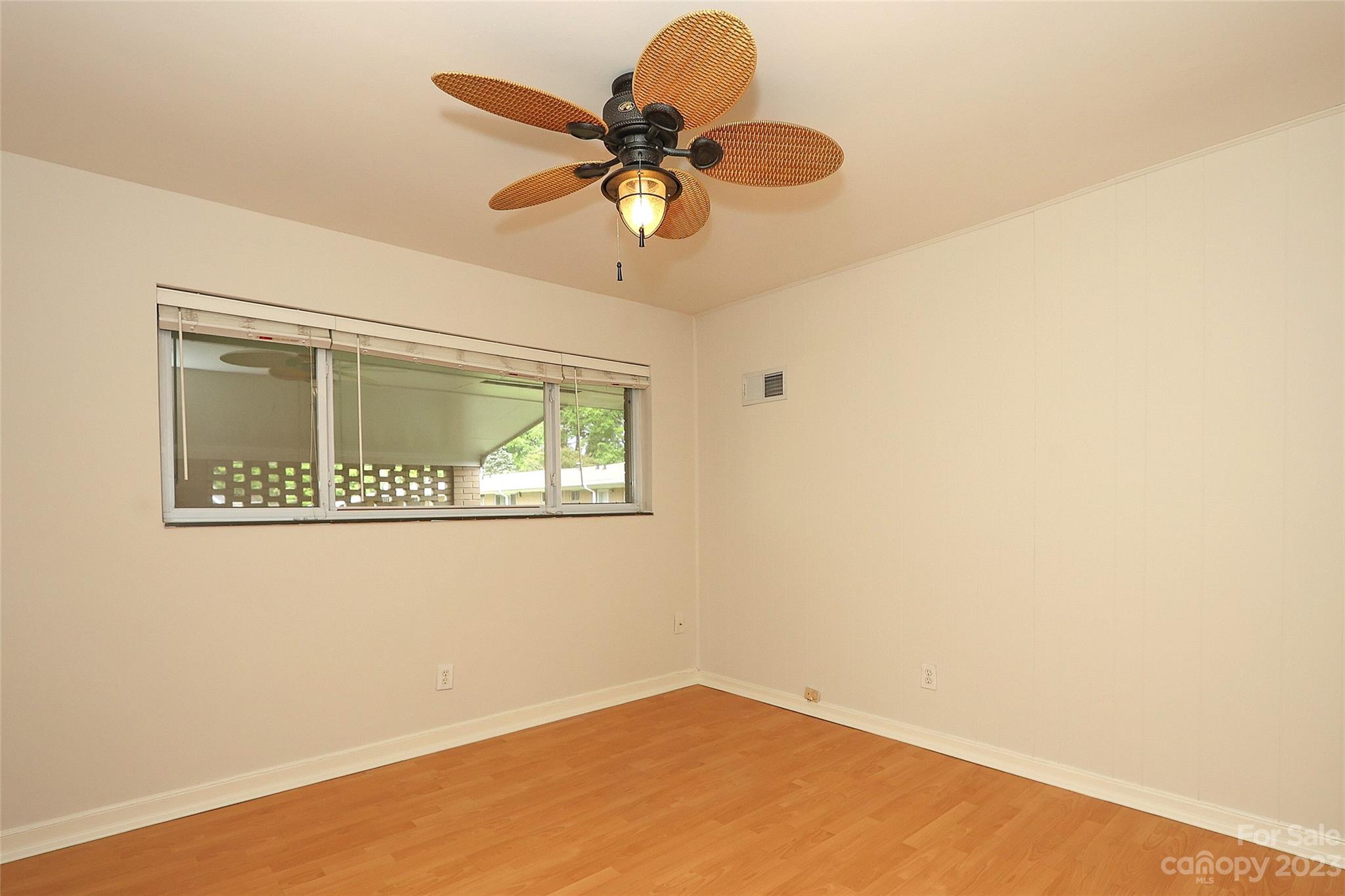 3010 Crosby Road, Unit 220 Charlotte, NC 28211 - Photo 30 of 39 a view of a room with a window and a ceiling fan