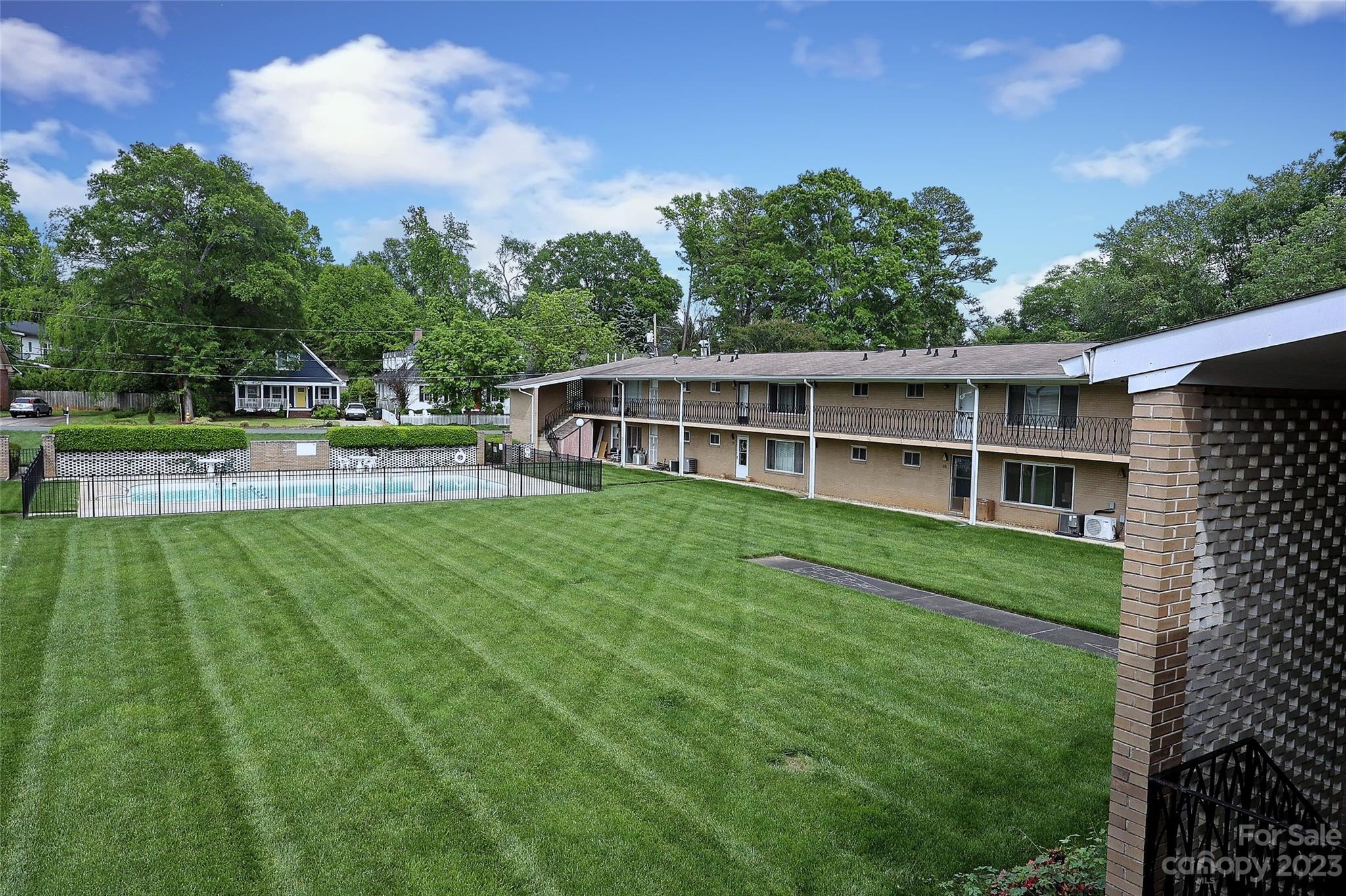 3010 Crosby Road, Unit 220 Charlotte, NC 28211 - Photo 37 of 39 a view of a house with a backyard