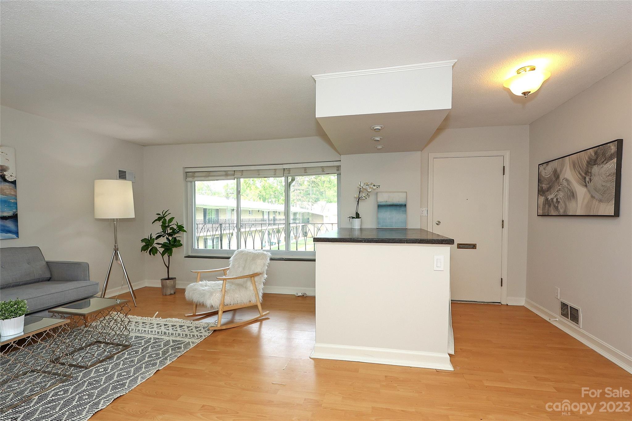 3010 Crosby Road, Unit 220 Charlotte, NC 28211 - Photo 7 of 39 a living room with furniture and a table