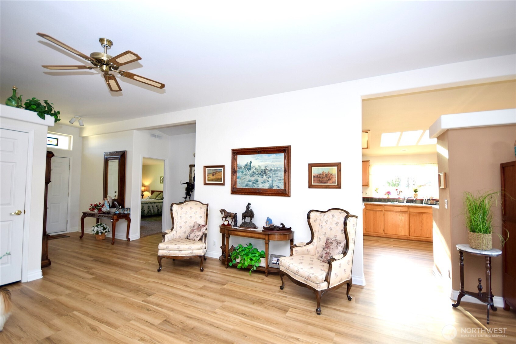 891 North Portside Way Sequim, WA 98382 - Photo 4 of 18 a living room with furniture and a wooden floor