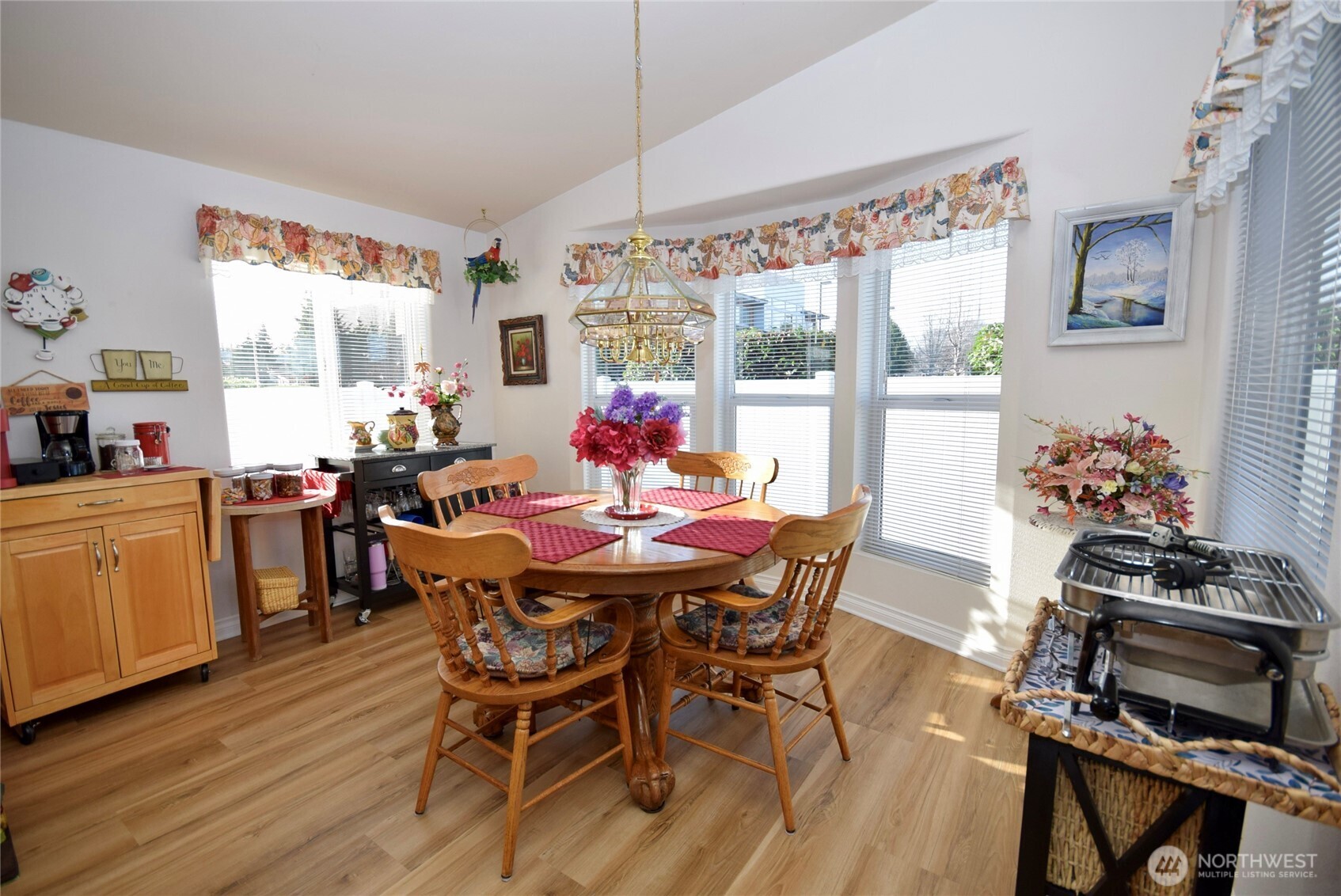 891 North Portside Way Sequim, WA 98382 - Photo 10 of 18 a view of a dining room with furniture window and outside view
