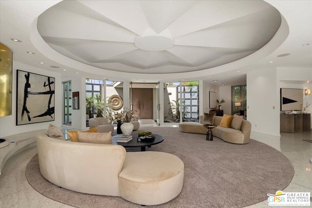 a kitchen with a table and chairs
