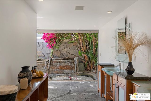 a view of a swimming pool with a garden