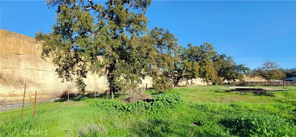 a view of outdoor space with deck and yard
