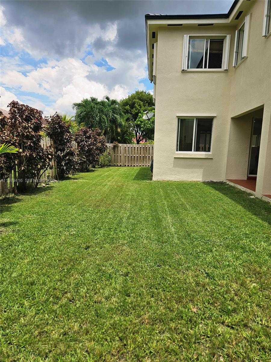 2864 Southwest 138th Path Miami, FL 33175 - Photo 18 of 19 a house view with a garden space