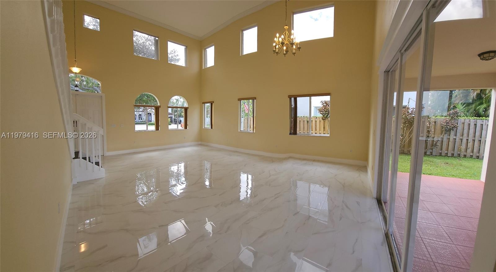 2864 Southwest 138th Path Miami, FL 33175 - Photo 3 of 19 a view of a porch with a dining table chairs
