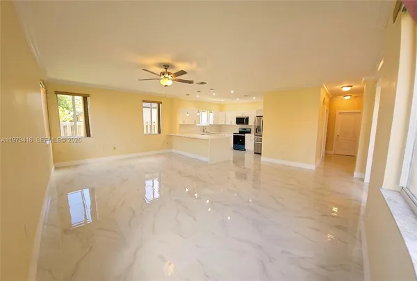 a view of a livingroom with a staircase