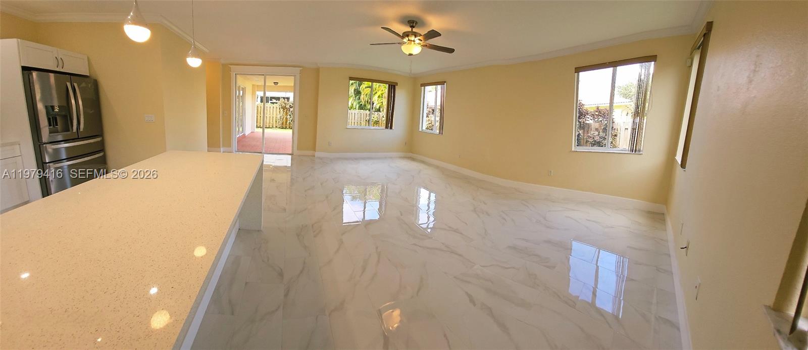 2864 Southwest 138th Path Miami, FL 33175 - Photo 6 of 19 a view of a livingroom with a staircase