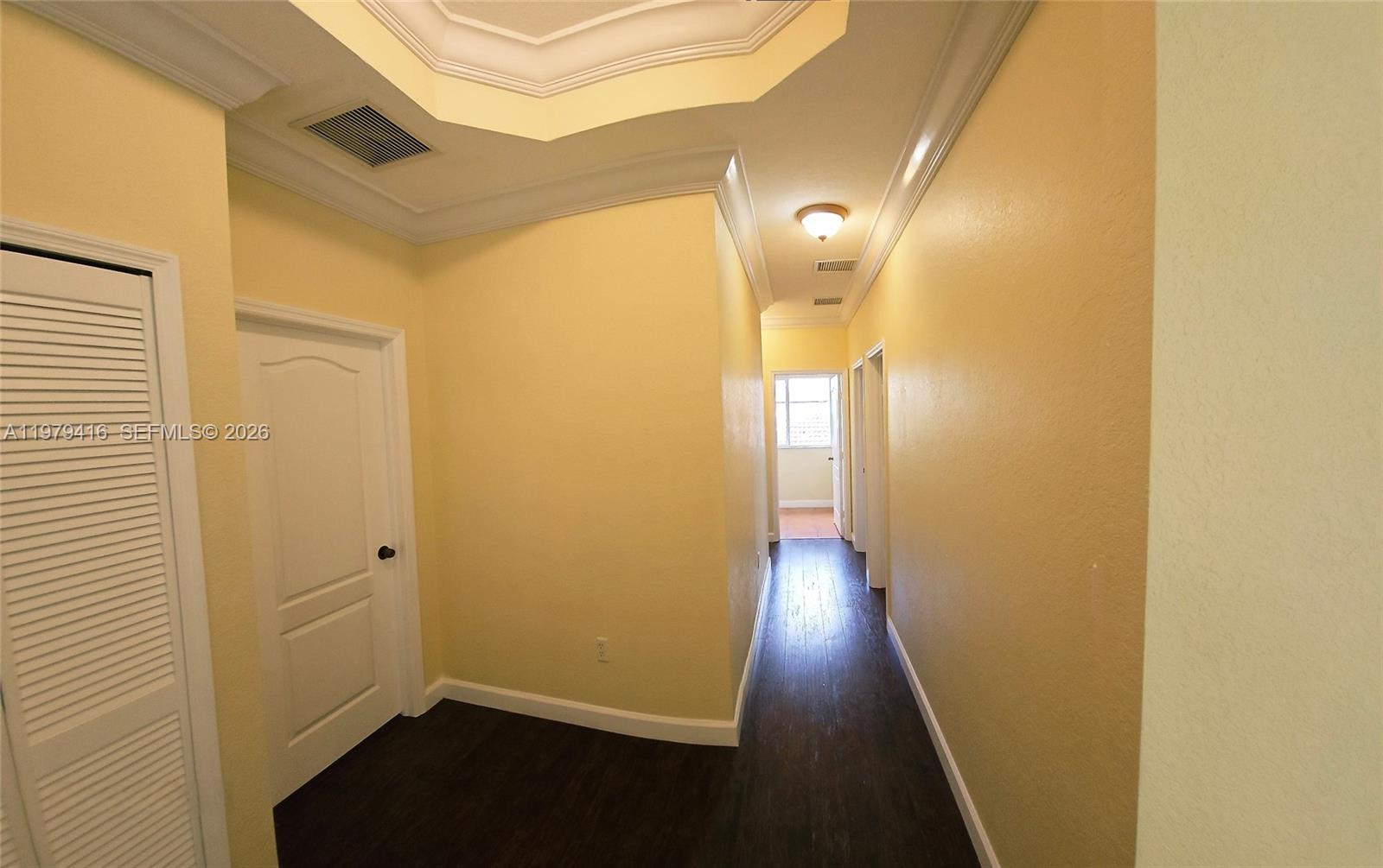 2864 Southwest 138th Path Miami, FL 33175 - Photo 10 of 19 a view of a hallway with wooden floor