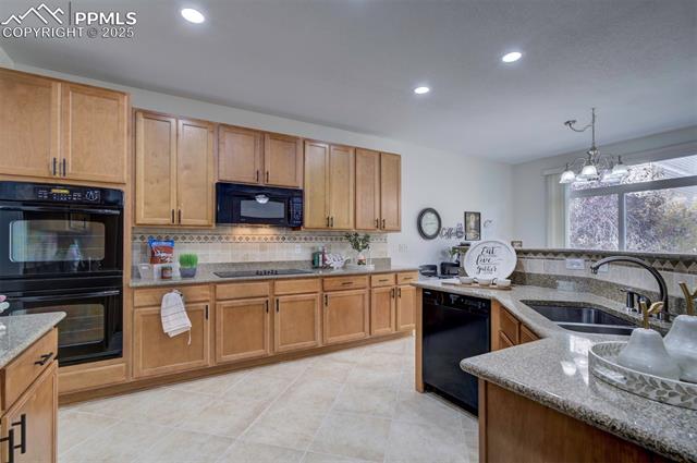 838 Altamont Ridge Drive Colorado Springs, CO 80921 - Photo 12 of 38 double oven and separate cooktop