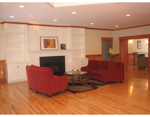 5 Longfellow Road Wellesley, MA 02481 - Photo 3 of 23 a living room with furniture and a fireplace