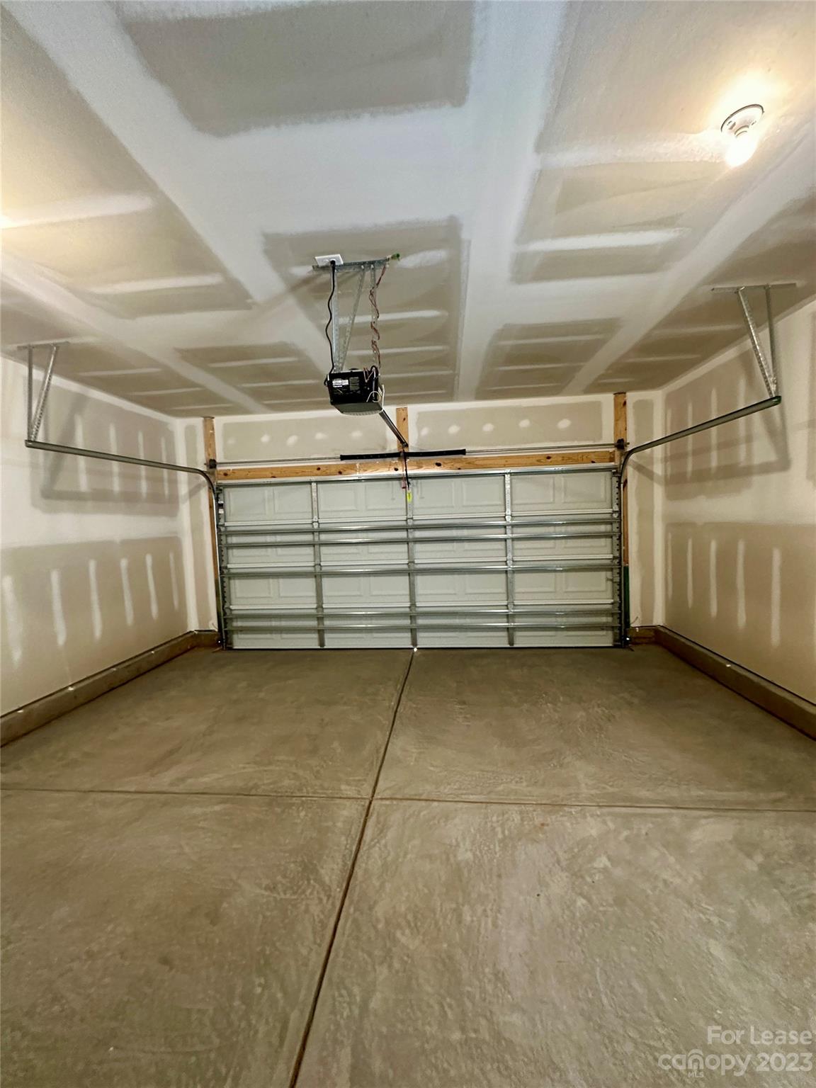9519 Pointer Road Huntersville, NC 28078 - Photo 11 of 34 a view of a room with racks on the wall