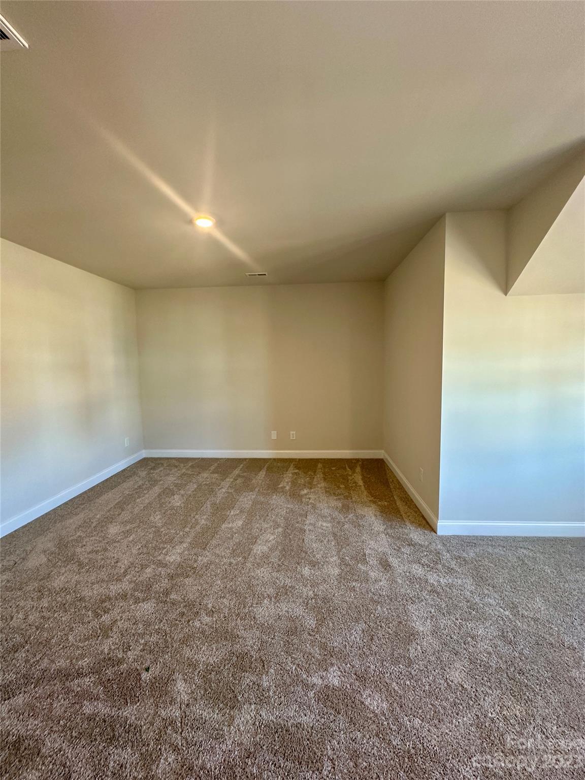 9519 Pointer Road Huntersville, NC 28078 - Photo 12 of 34 a view of a room with an empty space