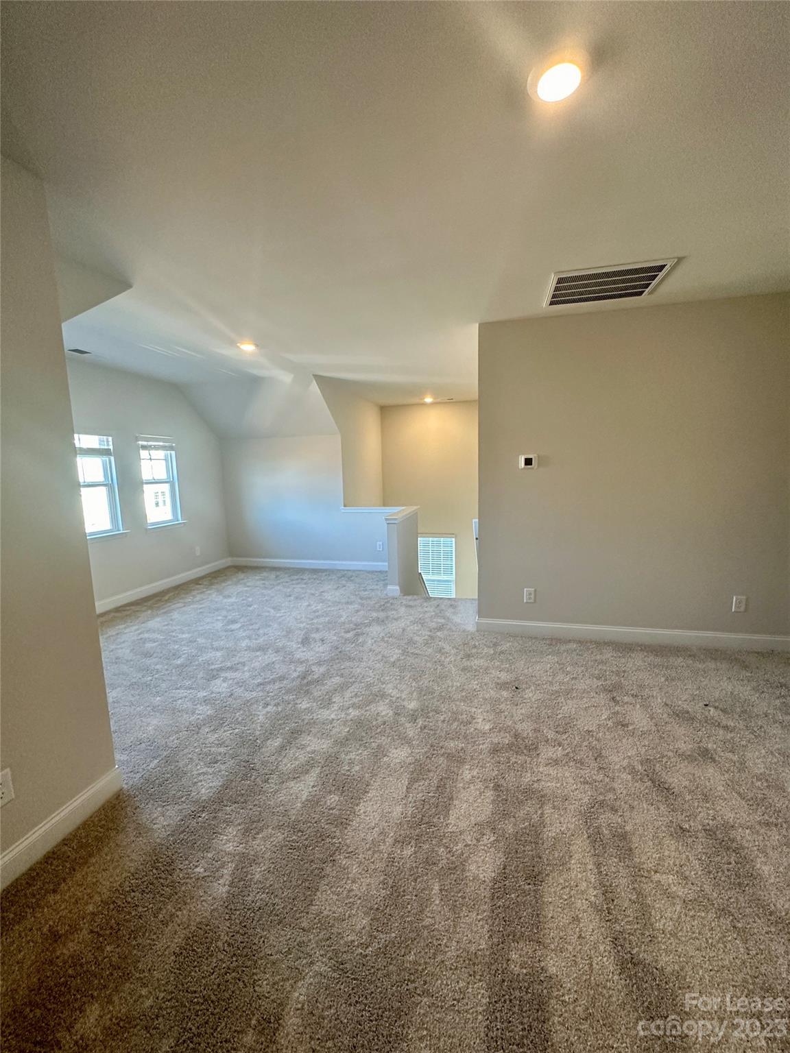9519 Pointer Road Huntersville, NC 28078 - Photo 13 of 34 a view of an empty room and window