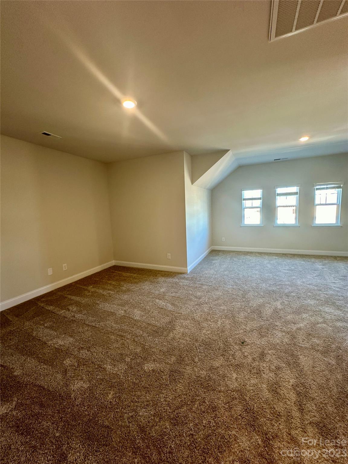9519 Pointer Road Huntersville, NC 28078 - Photo 15 of 34 an empty room with window