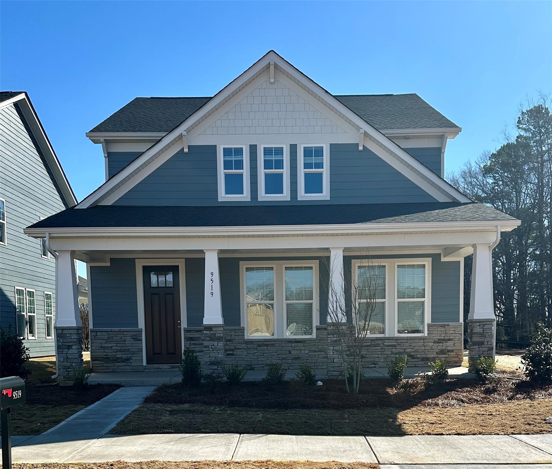 9519 Pointer Road Huntersville, NC 28078 - Photo 2 of 34 a front view of a house with a yard