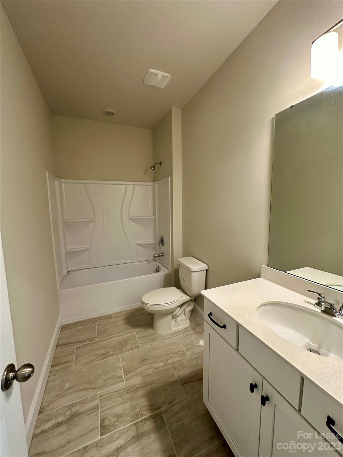 9519 Pointer Road Huntersville, NC 28078 - Photo 22 of 34 a bathroom with a sink a toilet and shower