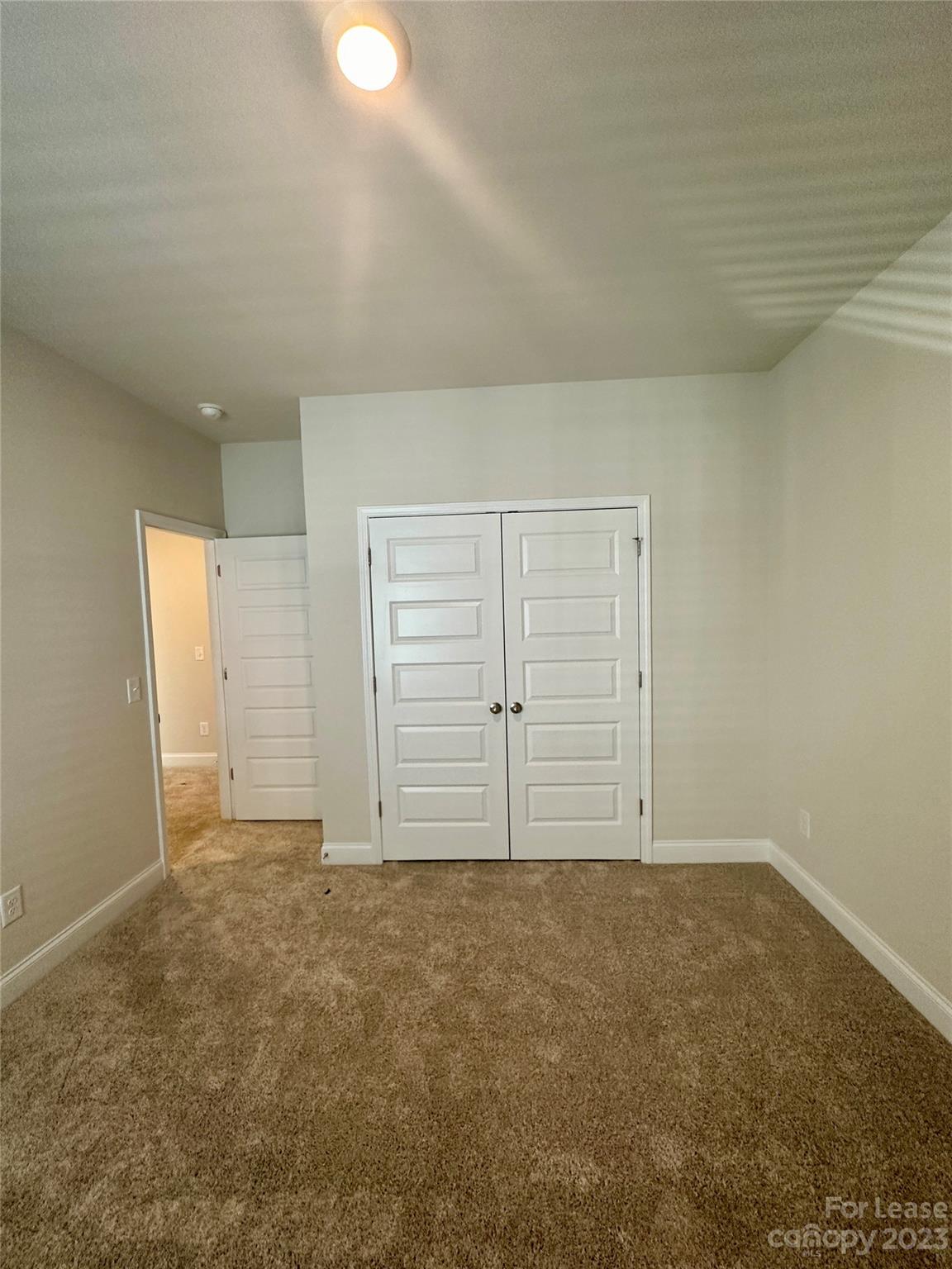 9519 Pointer Road Huntersville, NC 28078 - Photo 24 of 34 an empty room with closet area