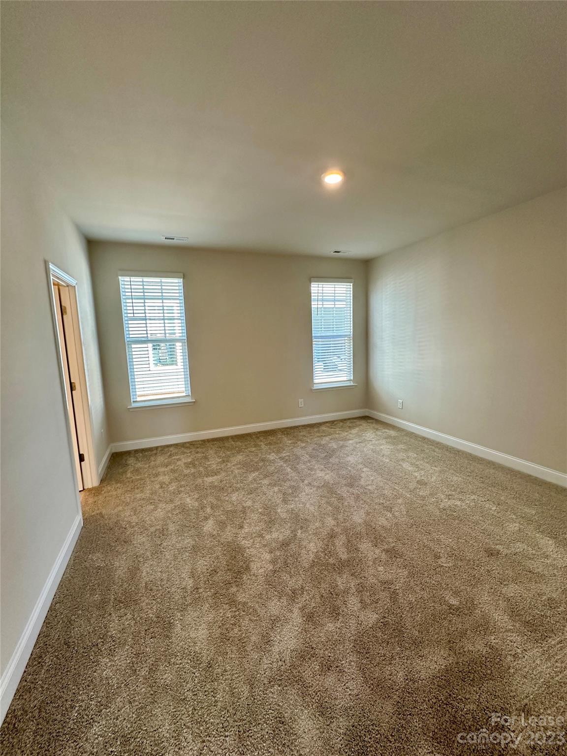 9519 Pointer Road Huntersville, NC 28078 - Photo 27 of 34 an empty room with windows