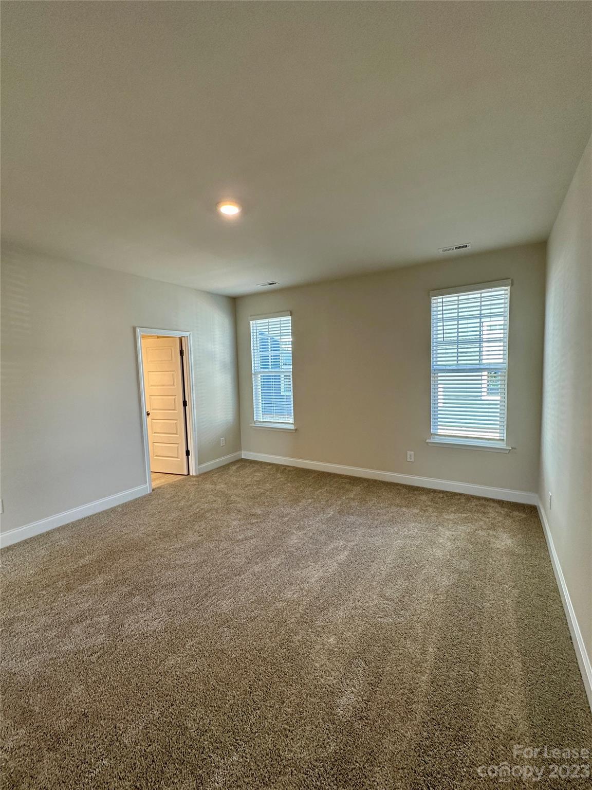 9519 Pointer Road Huntersville, NC 28078 - Photo 28 of 34 an empty room with windows