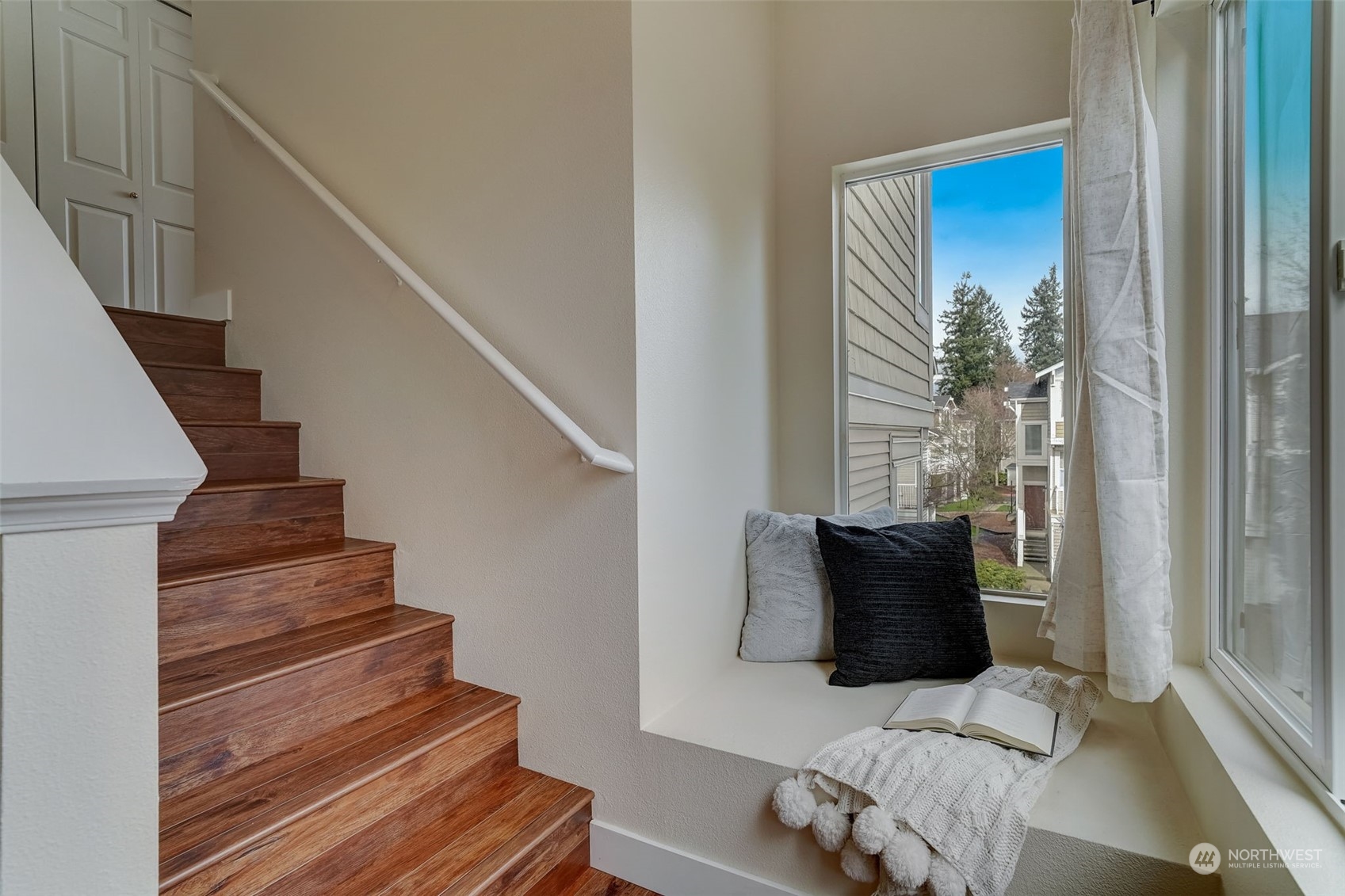 11873 Northeast 162nd Lane, Unit 121 Bothell, WA 98011 - Photo 13 of 32 a view of entryway and hall with wooden floor