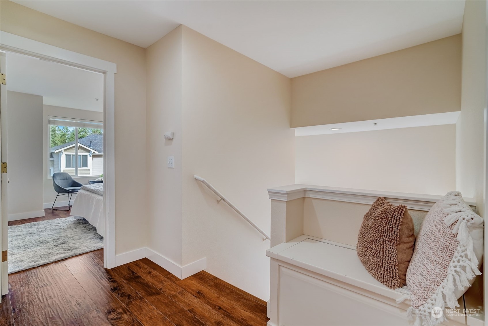 11873 Northeast 162nd Lane, Unit 121 Bothell, WA 98011 - Photo 14 of 32 a living room with a couch and wooden floor